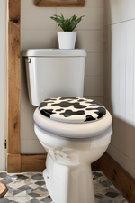 Load image into Gallery viewer, Cush'n Soft Cow Patch Padded Toilet Seat Lifestyle Image